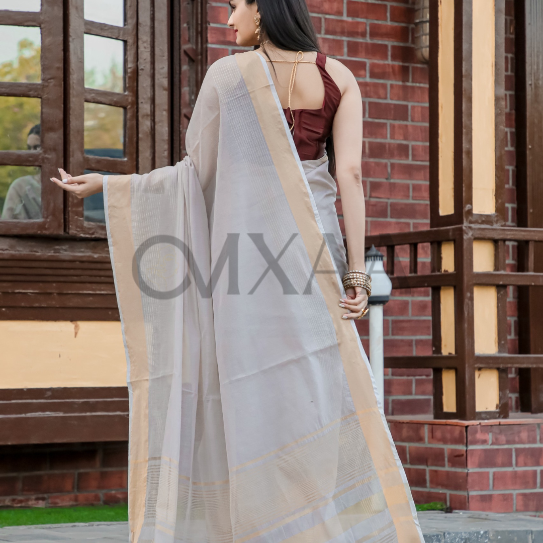 Timeless Grace- Pure Muslin Silk Luxurious Saree with Zari Work