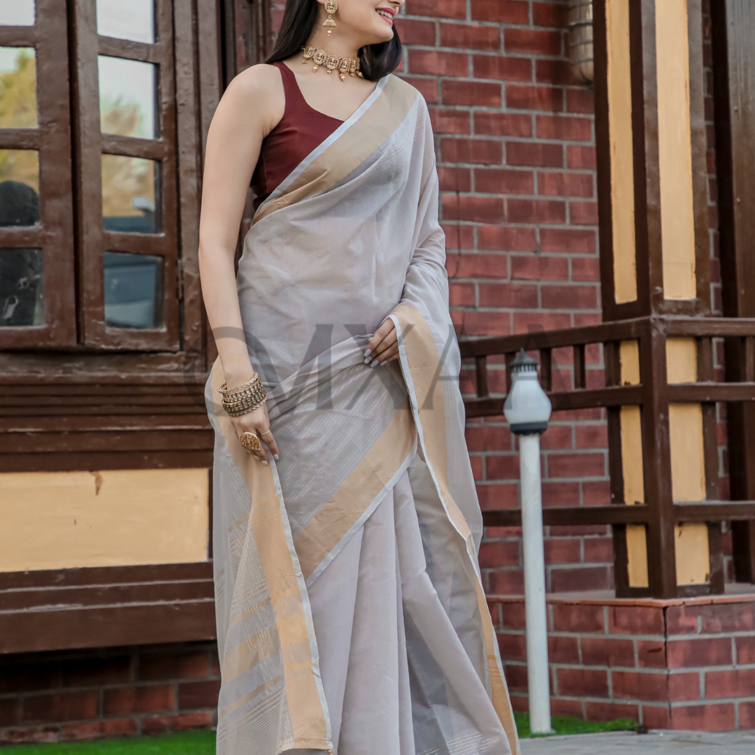 Timeless Grace- Pure Muslin Silk Luxurious Saree with Zari Work