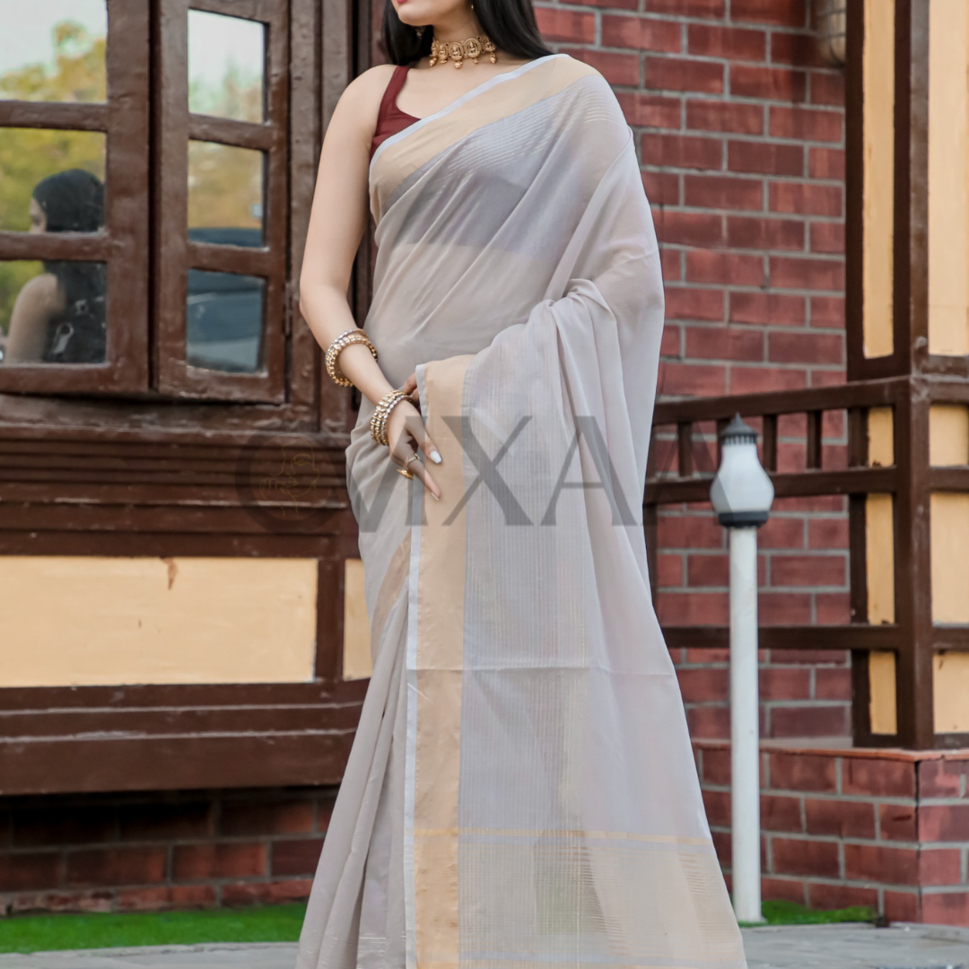 Timeless Grace- Pure Muslin Silk Luxurious Saree with Zari Work