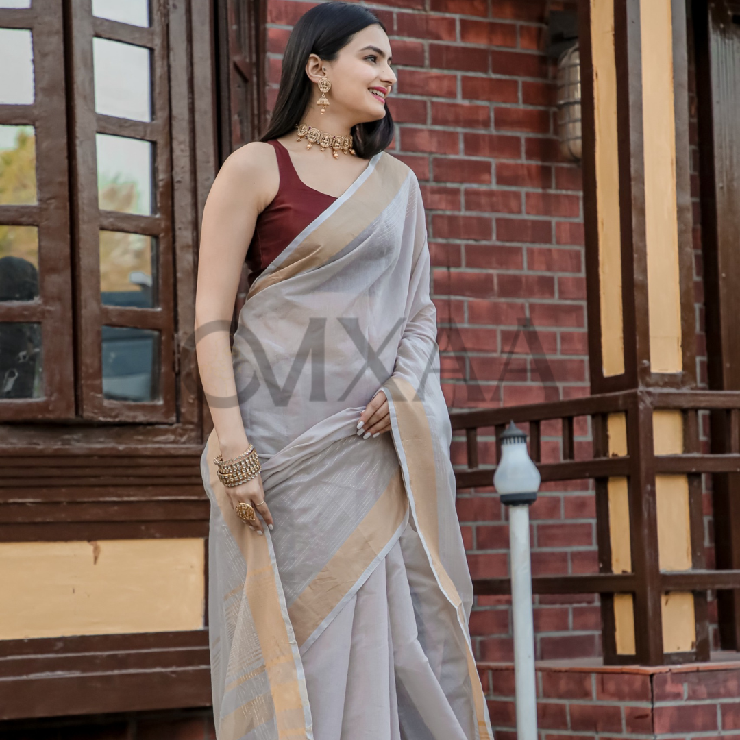 Timeless Grace- Pure Muslin Silk Luxurious Saree with Zari Work