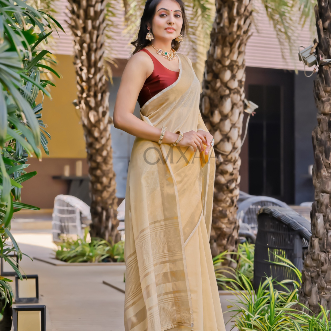 Golden Radiance- Luxurious Muslin Saree with Zari Work Border