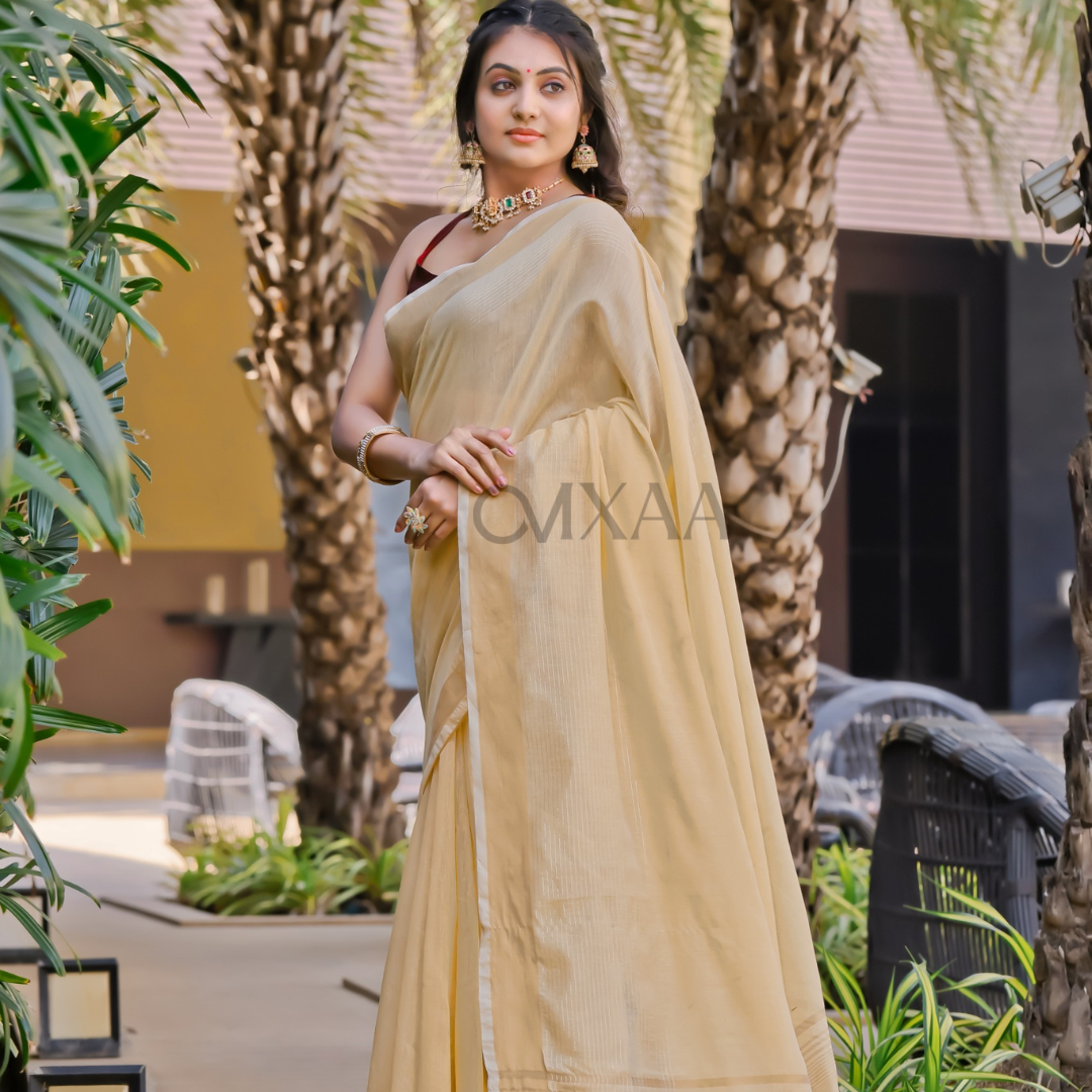 Golden Radiance- Luxurious Muslin Saree with Zari Work Border